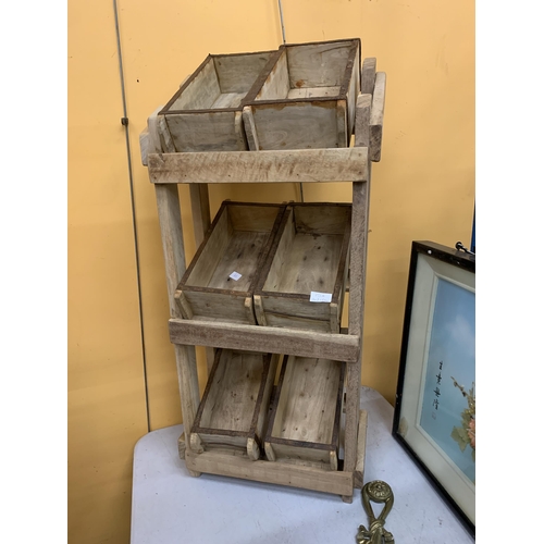 75A - A WOODEN STORAGE RACK WITH SIX BRICK MOULD BOXES