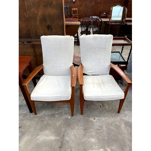 2687 - A PAIR OF PARKER KNOLL FIRESIDE CHAIRS MODEL NO. PK. 988/1023