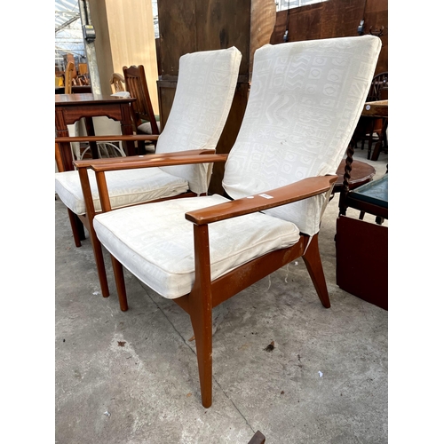 2687 - A PAIR OF PARKER KNOLL FIRESIDE CHAIRS MODEL NO. PK. 988/1023