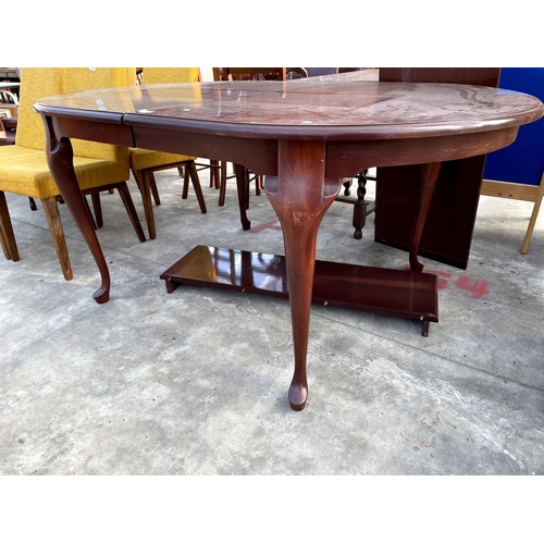 2691 - A MAHOGANY EXTENDING DINING TABLE ON CABRIOLE LEGS