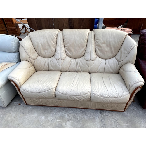 2703 - A CREAM LEATHER GIGLI, MOILI TAPPEZZATI (ITALY) THREE SEATER SETTEE