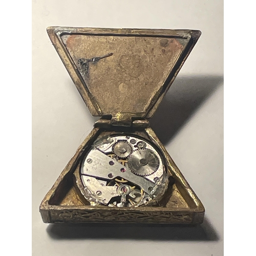 60 - A BRONZE MASONIC TRIANGULAR SHAPED WATCH