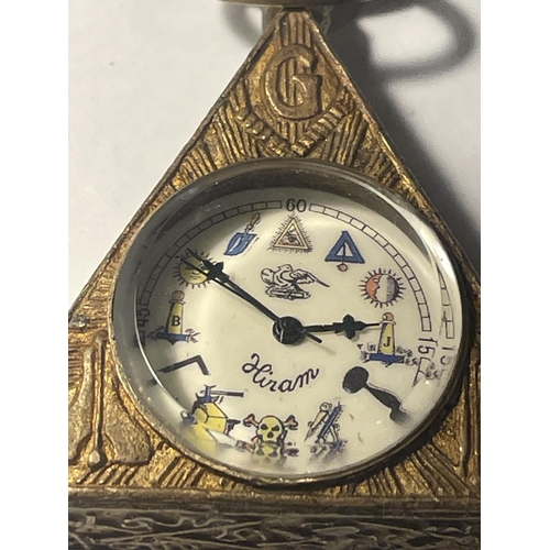 60 - A BRONZE MASONIC TRIANGULAR SHAPED WATCH