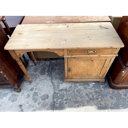 2840 - A VICTORIAN PINE KNEEHOLE DRESING TABLE WITH SINGLE DRAWER AND CUPBOARD, 48