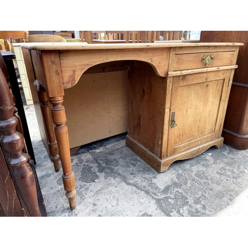 2840 - A VICTORIAN PINE KNEEHOLE DRESING TABLE WITH SINGLE DRAWER AND CUPBOARD, 48