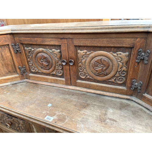 2842 - A MID 20TH CENTURY OAK COURT CUPBOARD WITH CARVED PANEL DOORS AND DRAWERS, 48