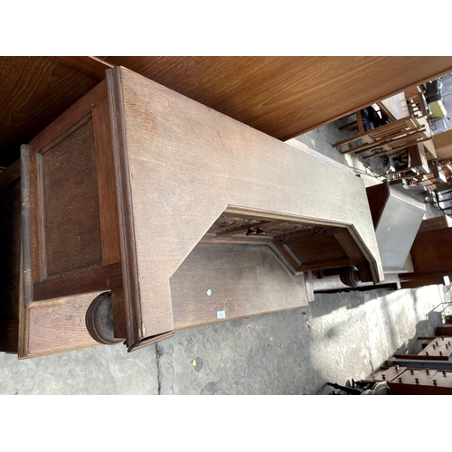 2842 - A MID 20TH CENTURY OAK COURT CUPBOARD WITH CARVED PANEL DOORS AND DRAWERS, 48