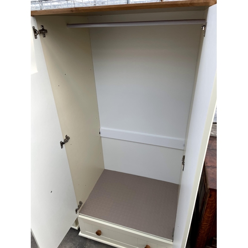 2844 - A MODERN TWO DOOR WARDROBE WITH DRAWER TO THE BASE, 31