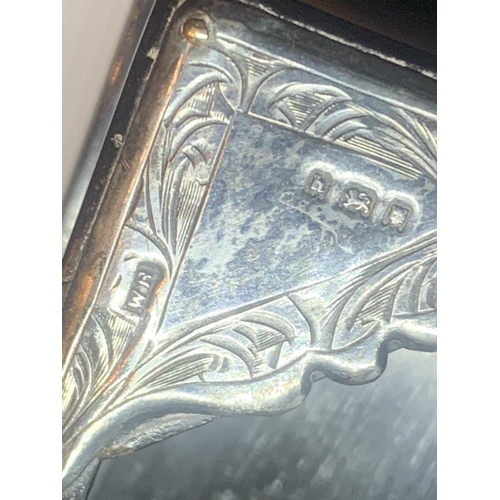 54A - AN EBONY TRAY WITH ORNATE HALLMARKED LONDON CORNERS