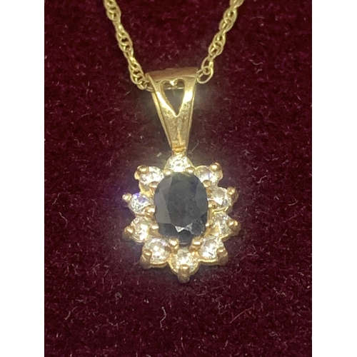 664 - A 9 CARAT GOLD NECKLACE WITH A SAPPHIRE AND CUBIC ZIRCONIA PENDANT GROSS WEIGHT 1.54 GRAMS IN A PRES... 