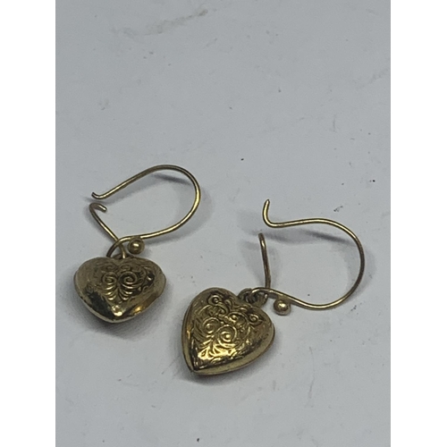 665 - A PAIR OF TESTED TO 9 CARAT GOLD HEART SHAPED EARRINGS GROSS WEIGHT 1.36 GRAMS