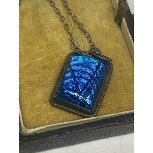 666 - A SILVER PENDANT WITH BLUE STONE IN A PRESENTATION BOX