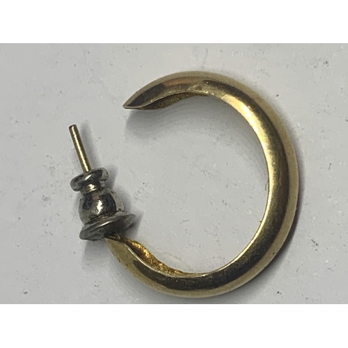 670 - A TESTED TO 9 CARAT GOLD HOOP EARRING GROSS WEIGHT 1.27 GRAMS