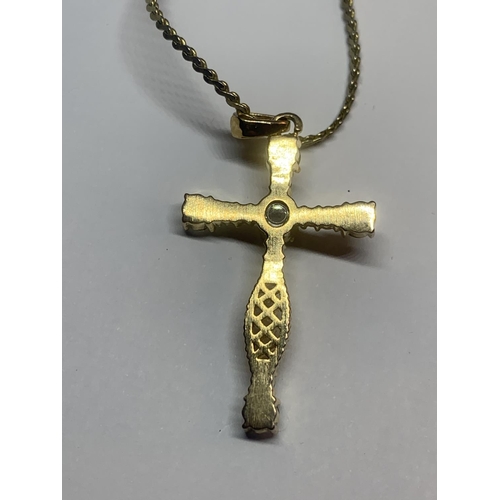 677 - A SWAROVSKI CRYSTAL CRUCIFIX ON A CHAIN