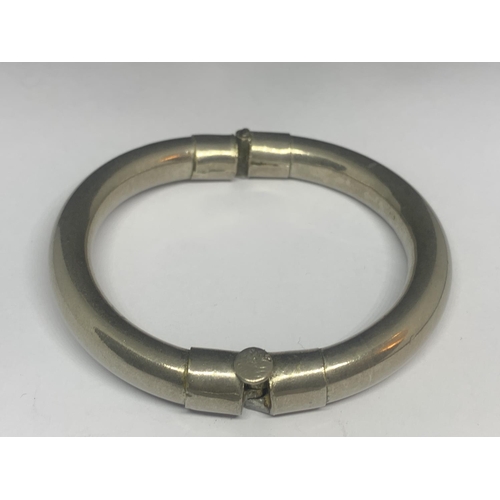 678 - TWO WHITE METAL BANGLES