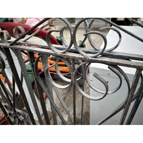 2230 - A PAIR OF WROUGHT IRON DECORATIVE GARDEN GATES