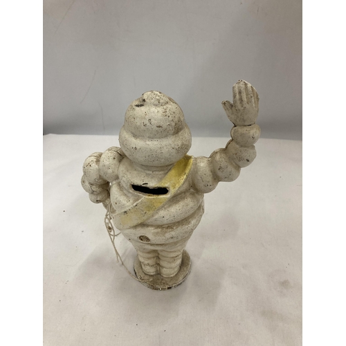 496 - A CAST MICHELIN MAN FIGURE APPROX 21 CM TALL