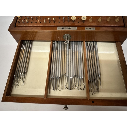 16 - AN DENTAL SURGEON'S ANTIQUE TRAVEL CABINET WITH CONTENTS