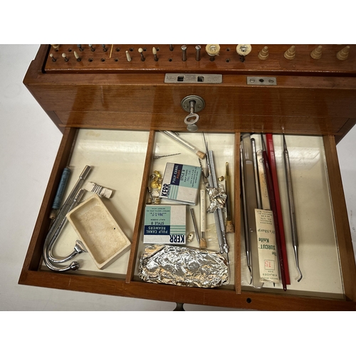 16 - AN DENTAL SURGEON'S ANTIQUE TRAVEL CABINET WITH CONTENTS