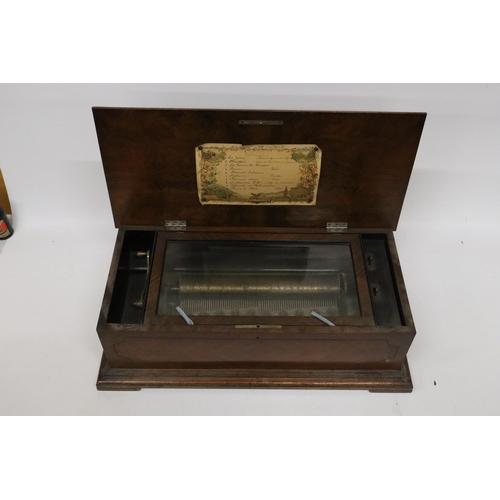 68 - A LATE 19TH CENTURY ROSEWOOD CASED MUSIC BOX WITH TEN AIRS - 66CM (W), 33CM (D), 21CM (H) - SPRING A... 