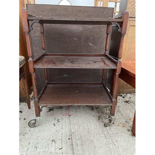 3147 - A MID 20TH CENTURY MAHOGANY THREE-TIER TROLLEY