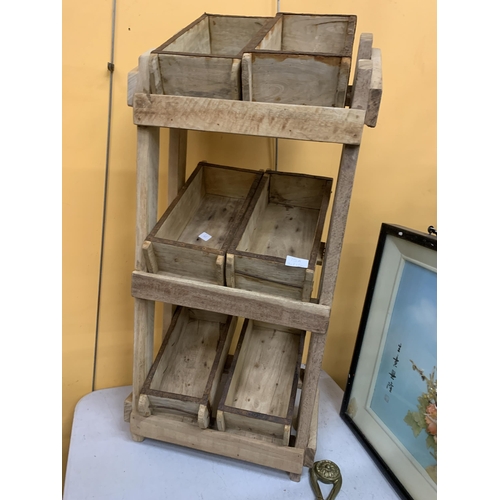 75A - A WOODEN STORAGE RACK WITH SIX BRICK MOULD BOXES