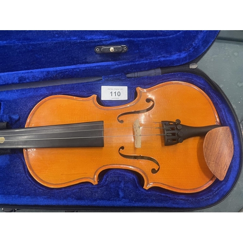 110 - A STENTOR STUDENT 1/4 VIOLIN IN A CASE