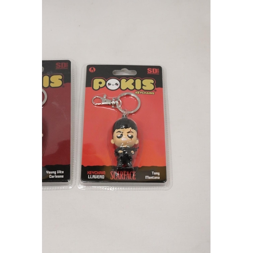 229 - TWO COLLECTABLE 'POKIS' KEYCHAINS TO INCLUDE THE GODFATHER AND SCARFACE