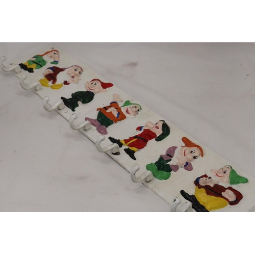 259 - A HEAVY CAST HAND PAINTED 'SEVEN DWARFS' COAT RACK