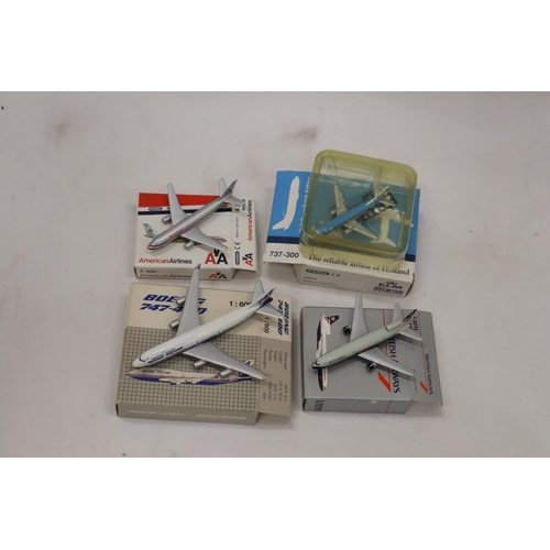 265 - FOUR BOXED MODEL AEROPLANES