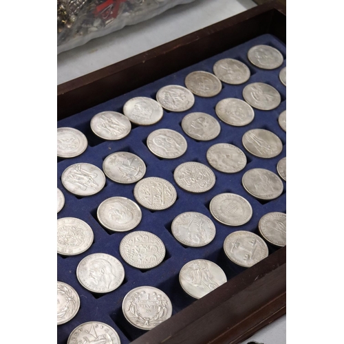 460 - FORTY FOUR VARIOUS VINTAGE TOKENS/COINS IN A WOODEN BOX