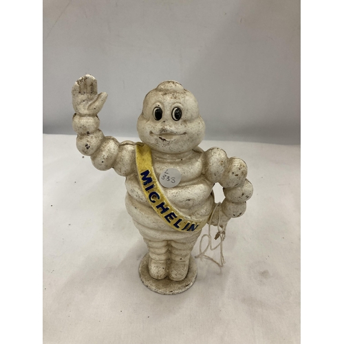 496 - A CAST MICHELIN MAN FIGURE APPROX 21 CM TALL