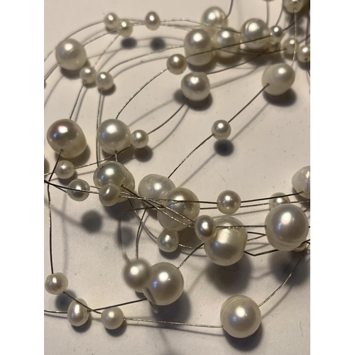 530 - A SILVER AND PEARL NECKLACE