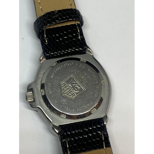 582A - A VINTAGE TAG HEUER FORMULA I WRIST WATCH SEEN WORKING BUT NO WARRANTY