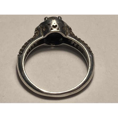 589 - A SILVER DRESS RING WITH SQUARE CLEAR STONE IN A PRESENTATION BOX