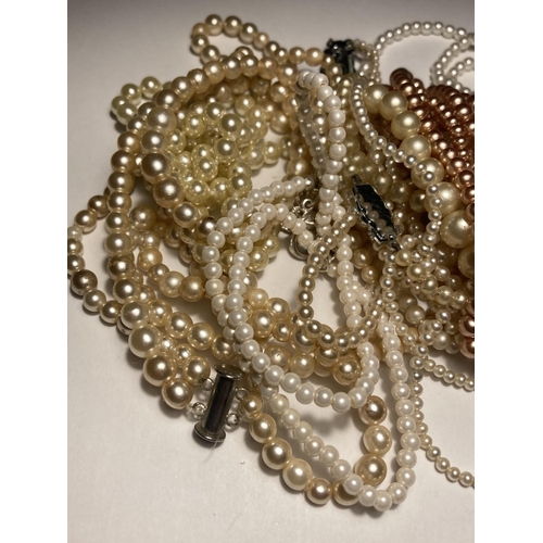 590 - A LARGE QUANTITY OF PEARL NECKLACES