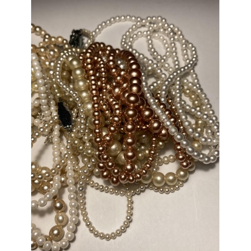 590 - A LARGE QUANTITY OF PEARL NECKLACES