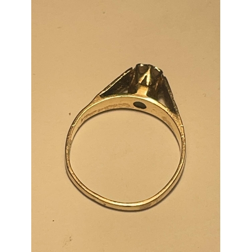 595 - A 9 CARAT GOLD DIAMOND SOLITAIRE RING