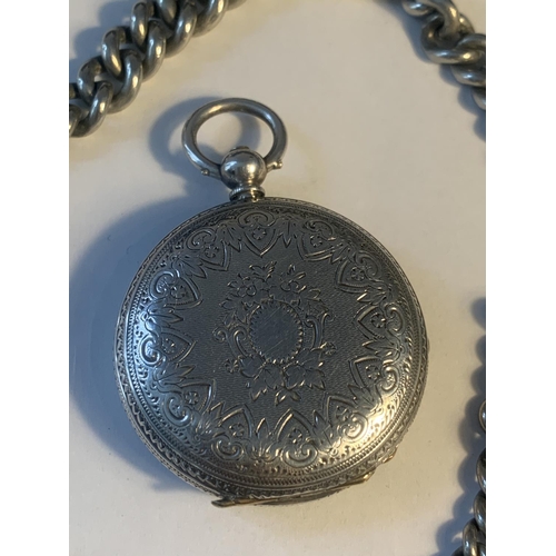 635 - A MARKED FINE SILVER POCKET WATCH WITH DECORATIVE FACE AND A CHAIN