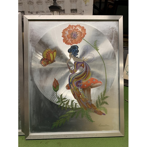 944 - TWO FRAMED PRINTS WITH A SILVERED BACKGROUND, ONE OF BIRDS, THE OTHER A FAIRY SITTING ON A TOADSTOOL