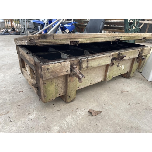 1767 - A LARGE VINTAGE WOODEN MULTISECTION STORAGE BOX - VENDOR BELIEVES POSSIBLY FROM A TANK