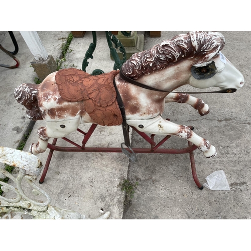 1868 - A VINTAGE PLASTIC CHILDS ROCKING HORSE WITH METAL FRAME AND BASE