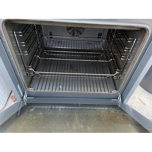 2459 - A BLACK AND WHITE INTERGRATED DOUBLE OVEN