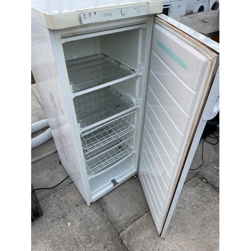 2469 - A WHITE UPRIGHT FREEZER