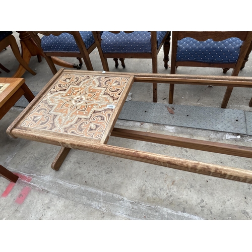 2548 - A RETRO TEAK COFFEE TABLE PARTLY TILED BUT LACKING GLASS TOP