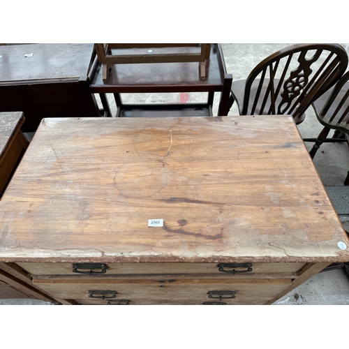 2562 - A LATE VICTORIAN SATINWOOD CHEST OF THREE GRADUATED DRAWERS 36