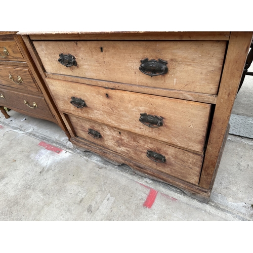 2562 - A LATE VICTORIAN SATINWOOD CHEST OF THREE GRADUATED DRAWERS 36