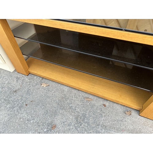 2587 - A MODERN OAK CABINET WITH GLASS TOP AND TWO GLASS SHELVES