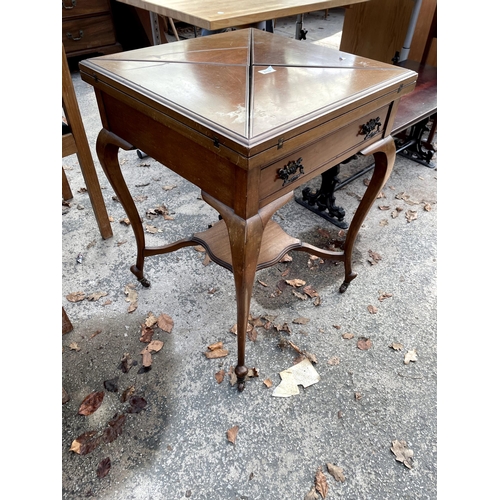 2762 - A LATE VICTORIAN MAHOGANY ENVELOPE CARD TABLE WITH SINGLE DRAWER AND UNDER SHELF