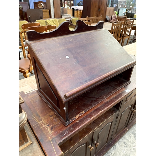 2841 - A MODERN PINE RESTAURANT SIDEBOARD ENCLOSING DRAWER AND CUPBOARDS, COMPLETE WITH WRITING SLOPE, 59